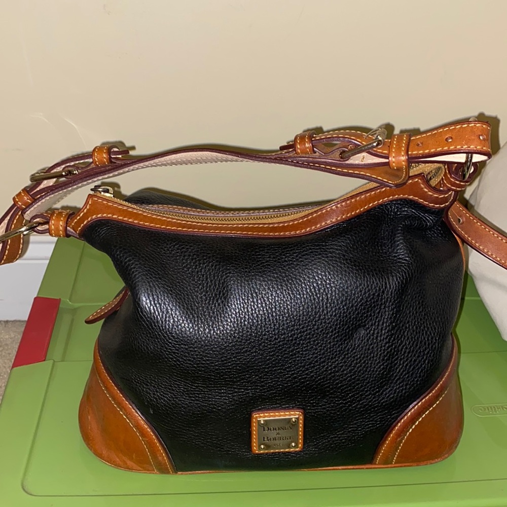 Dooney & Bourke black and brown satchel. Good condition